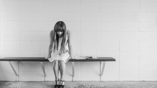 worried girl, woman, waiting, sitting, thinking, worry, black and white, sad, expression, people, person, depression, sadness, emotion, unhappy, adult, depressed, grief, frustration, despair, human, sad girl, problem, stressed, young, female, girl, long hair, dress, bench, concrete, wall