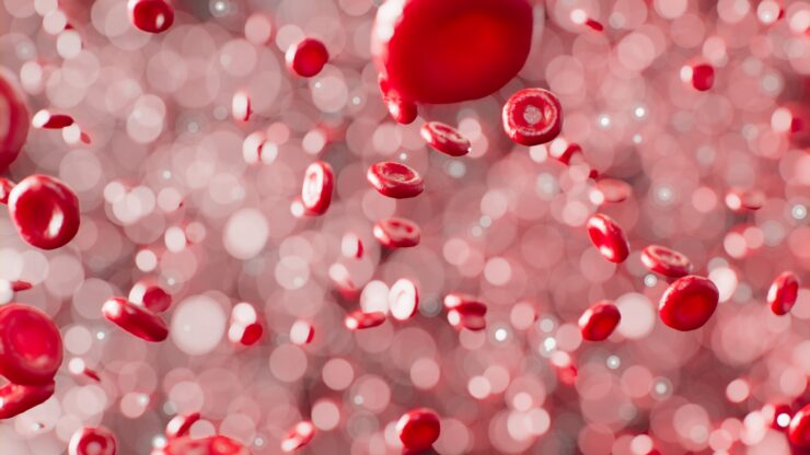 a bunch of red bubbles floating in the air