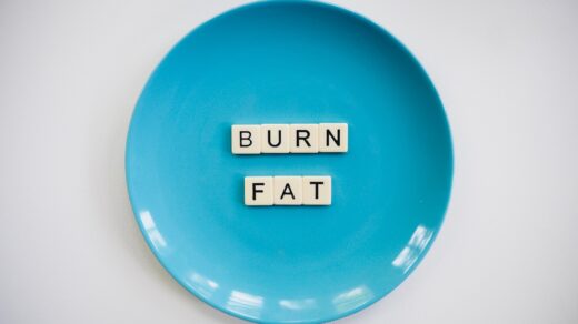 a blue plate with the words burn fat spelled on it