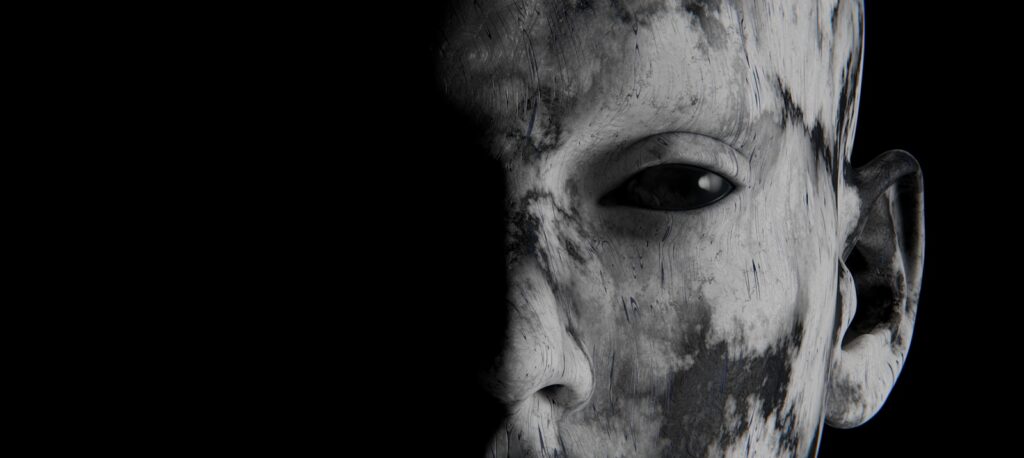 A spooky face peeks from the darkness.