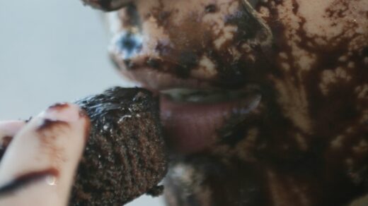 person with black and white face paint