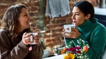 Two friends talking about their childhood memories